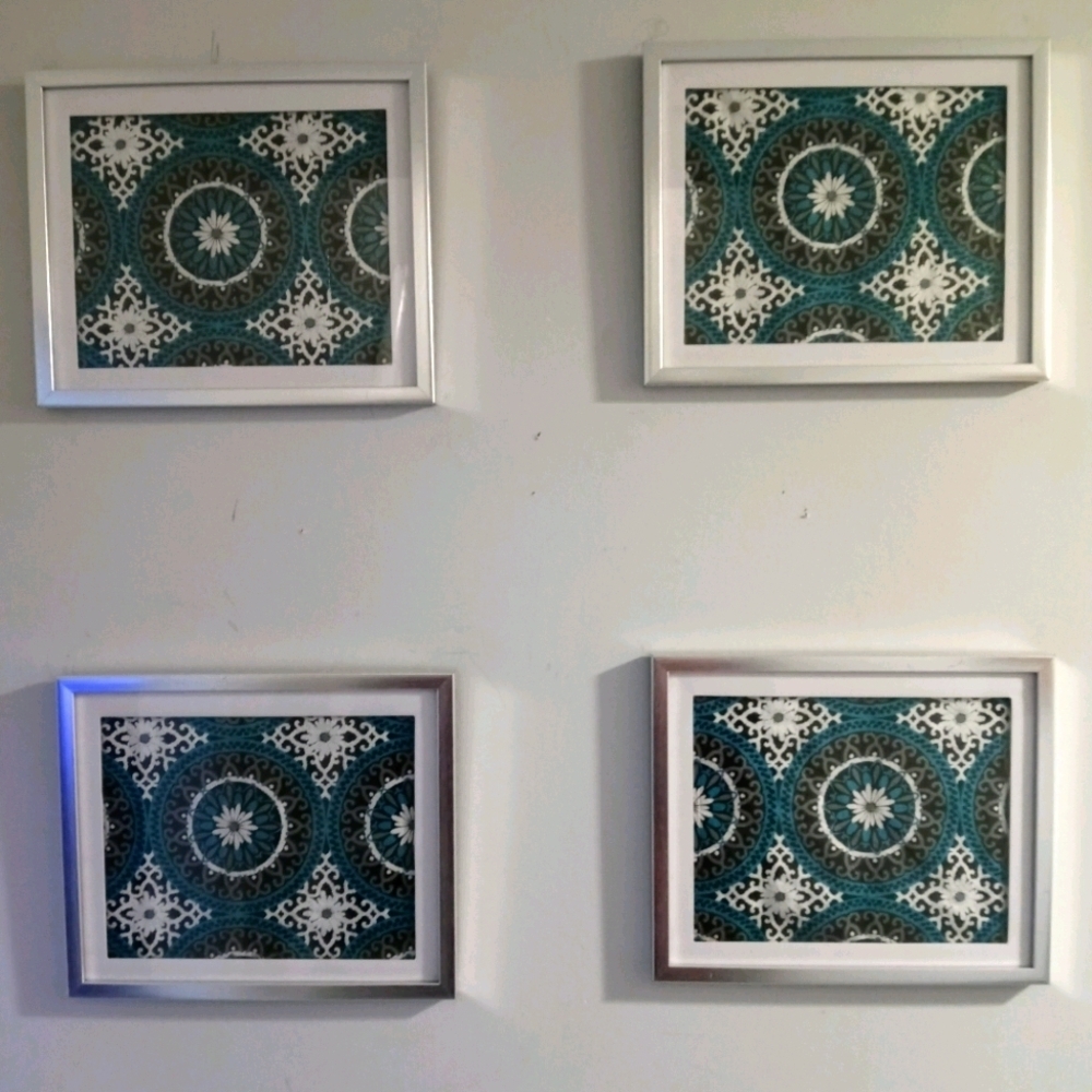 4 decorative silver framed pictures size 8 x 10